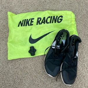 Men’s size 9 used track cleats. Comes with neon bag.
